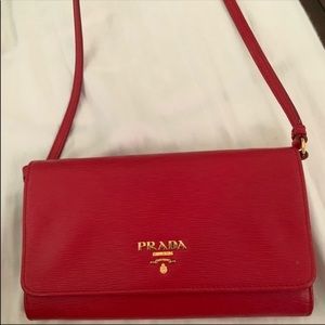 Red Prada crossbody wallet